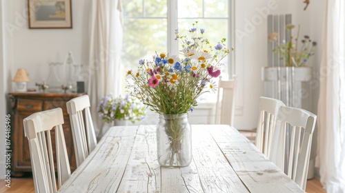 Wallpaper Mural Clean, white dining room with a simple centerpiece of colorful mixed wildflowers in a mason jar Torontodigital.ca