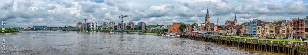 Temse Skyline - Cityscape With River and Cloudy Sky Temse Skyline - Cityscape With River and Cloudy Sky