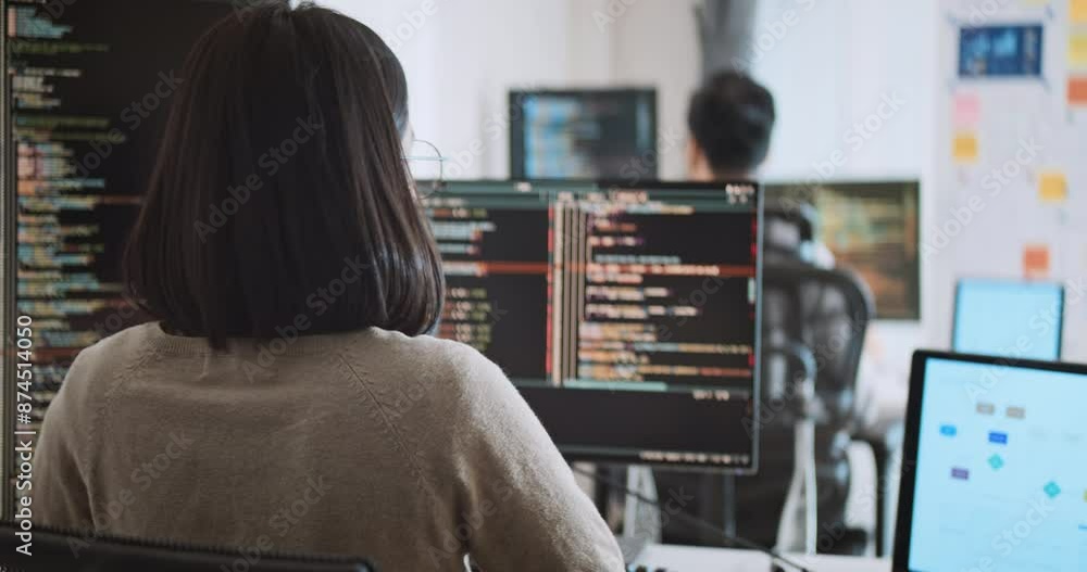 Young adult Asian male, female software developer coding program on desktop computer. Man, woman work from home, remote working, freelance programmer job, smart digital nomad lifestyle concept