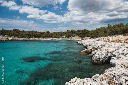 Beautiful turquoise blue sea along the rocky coast of Atspas beach on the island of Thasos in Greece