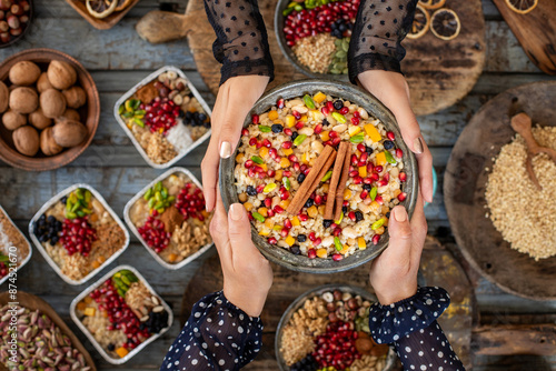 Ashure dessert with legumes and dried fruits named aşure or asure . Noah’s pudding in the bowl. 