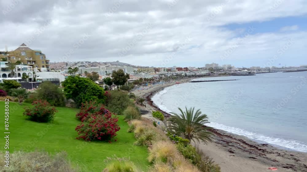 View of Fanabe beach in Costa Adeje, Tenerife,Canary Islands,Spain.Summer vacation,relax or travel concept. View of Fanabe beach in Costa Adeje, Tenerife,Canary Islands,Spain.Summer vacation,relax or travel concept.