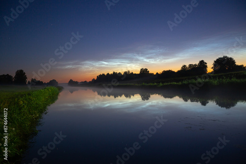 Bright noctilucent clouds photo