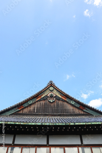 Background landscape of the beauty of Nijo Castle in Kyoto with a clear sky and mountains and trees in summer. nuances of ancient Japanese architecture photo