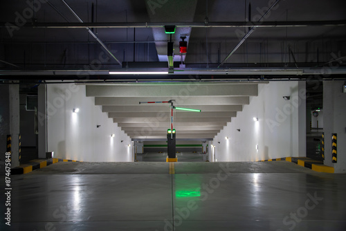 Automatic license plate recognition parking facility in the underground parking lot of a modern building in the city
