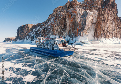 Bilde på lerret Hovercraft parked on a blue cracked ice of the lake Baikal