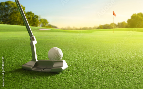 Tableau sur toile Close-up golf ball and golf putter before putting to the hole.