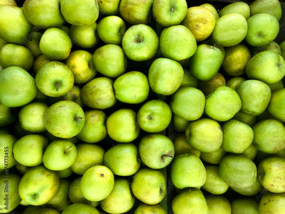 Fresh green apple fruit images. Lot of tasty apples fruits background Fresh green apple fruit images. Lot of tasty apples fruits background