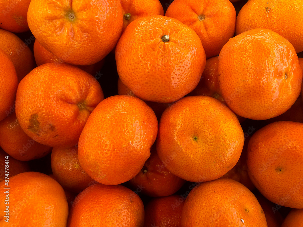 Fresh orange fruit images. Lot of healthy orange fruits background Fresh orange fruit images. Lot of healthy orange fruits background