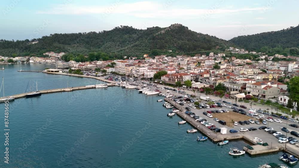 Aerial drone view of Limenas or Thassos City in Thassos Island , Greece. Establishing bird's eye view of a harbor town Aerial drone view of Limenas or Thassos City in Thassos Island , Greece. Establishing bird's eye view of a harbor town