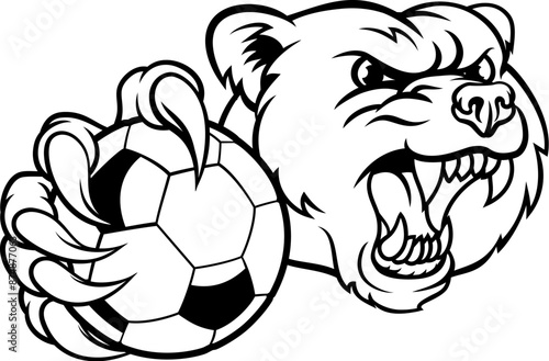 A grizzly bear soccer football animal mascot holding a ball in his claw