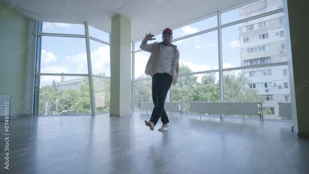 Man Breakdancing in Modern Studio Man Breakdancing in Modern Studio
