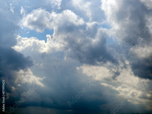 Cumulus clouds. White clouds on the blue sky close-up.