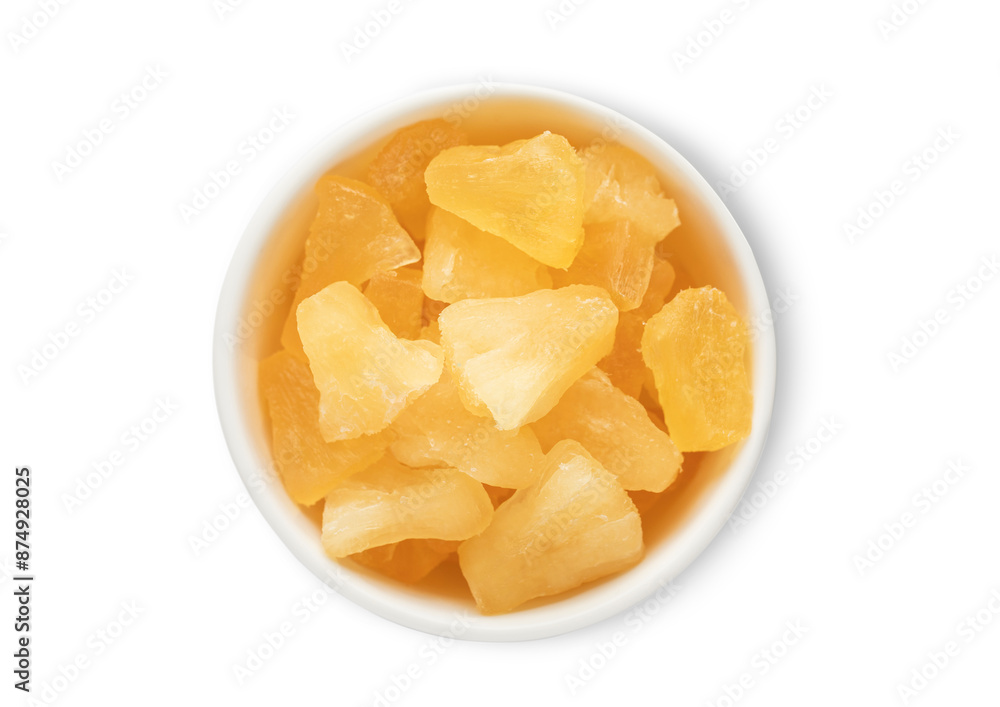 Ceramic bowl with sweet dried soft pineapple pieces isolated on white background.Top view. Ceramic bowl with sweet dried soft pineapple pieces isolated on white background.Top view.