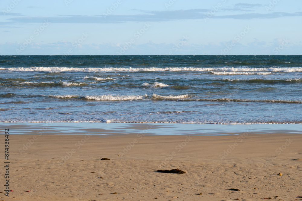 Gentle waves wash the beach - Torquay, Victoria, Australia Gentle waves wash the beach - Torquay, Victoria, Australia