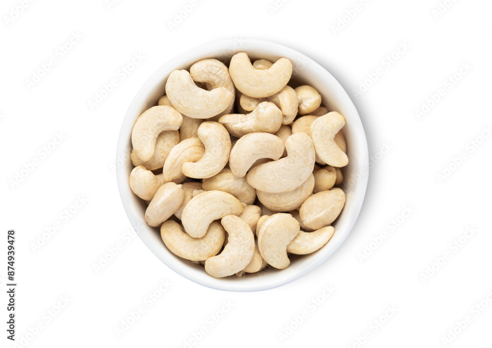 Bowl with organic white cashew nuts isolated on white background.Top view. Bowl with organic white cashew nuts isolated on white background.Top view.