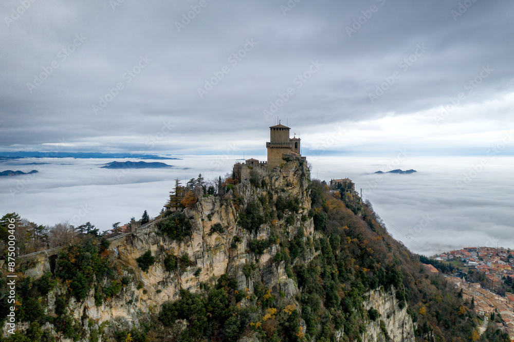 San Marino castle first Guaita tower enveloped by clouds San Marino castle first Guaita tower enveloped by clouds
