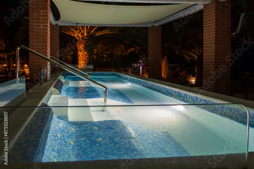 A small pool for evening relaxation in the seaside landscape. photo