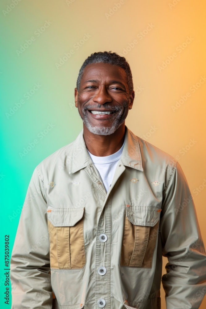Middle-aged African American Man: In his early 50s with a joyful smile Middle-aged African American Man: In his early 50s with a joyful smile