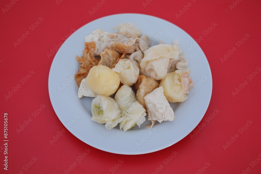Siomay, Indonesian traditional street food with spicy peanut sauce Siomay, Indonesian traditional street food with spicy peanut sauce