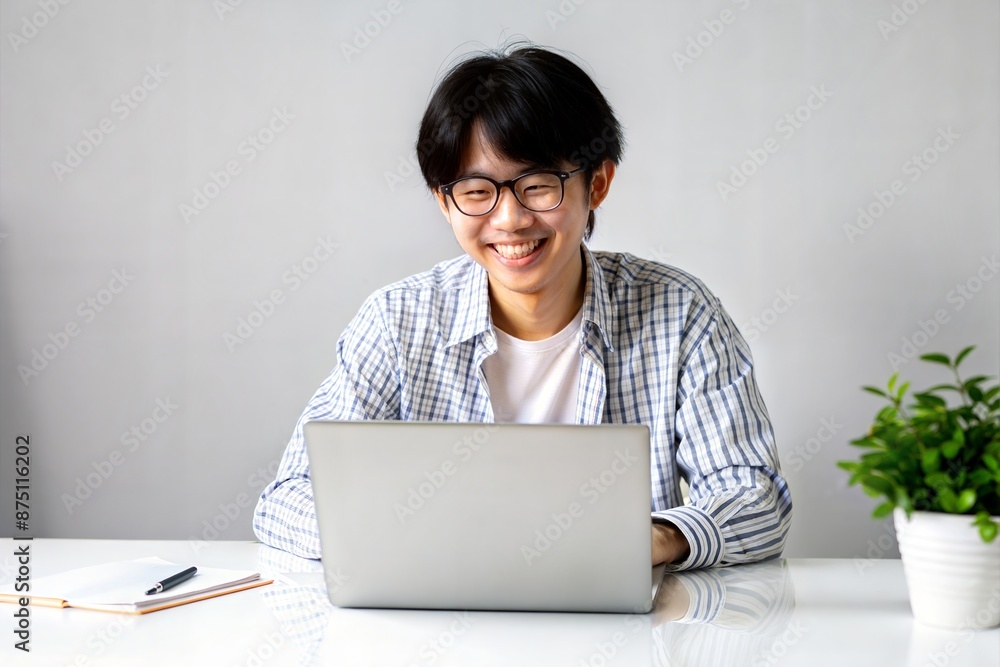 Smiling Asian Student Participating in E-Learning
Smiling Asian Student Participating in E-Learning