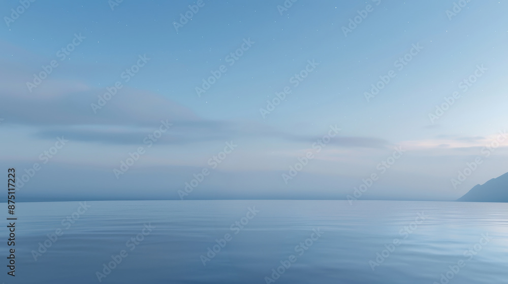 Obraz premium A calm, clear blue ocean with a few clouds in the sky