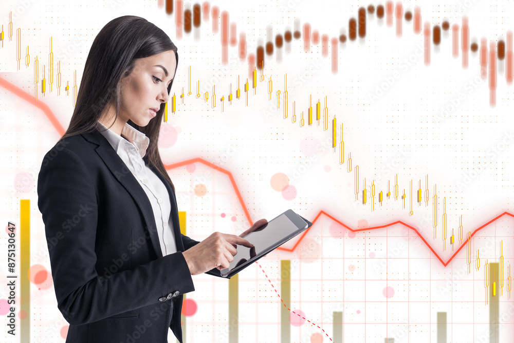 A professional businesswoman holding a digital tablet, against a background with financial charts and graphs symbols A professional businesswoman holding a digital tablet, against a background with financial charts and graphs symbols