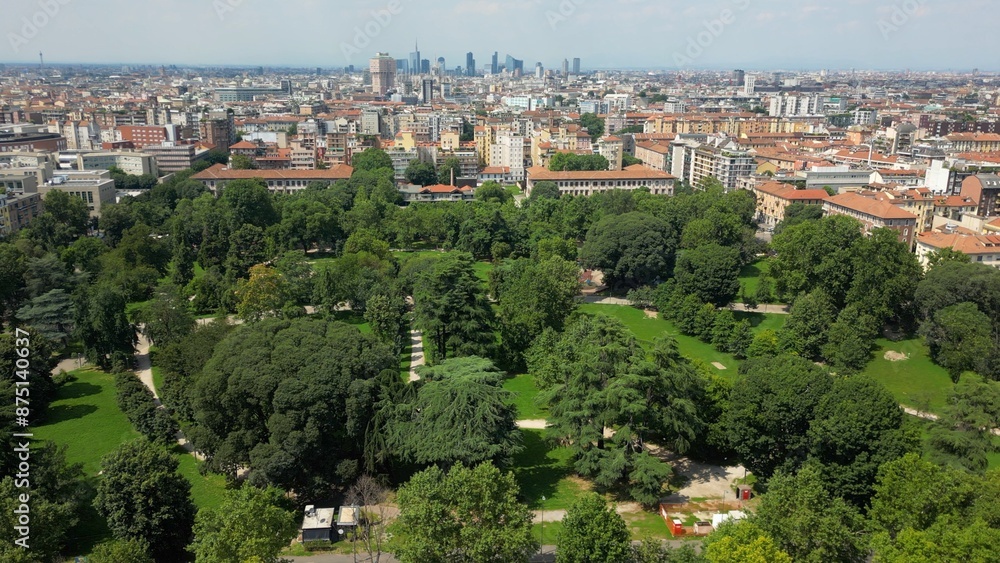 Fototapeta premium Europe, Italy, Milan Green city , Ravizza park view from the drone . Green park in downtown of the city and new skyline , Green revolution