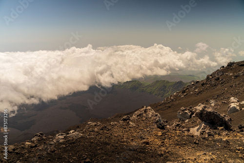 Obraz na płótnie Clouds naturally formed around mount etna volcano on the top altitude w salonie