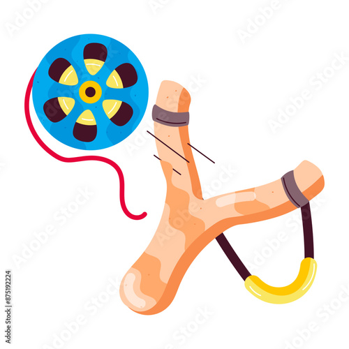 Slingshot with film reel denoting hit movie, flat sticker 

