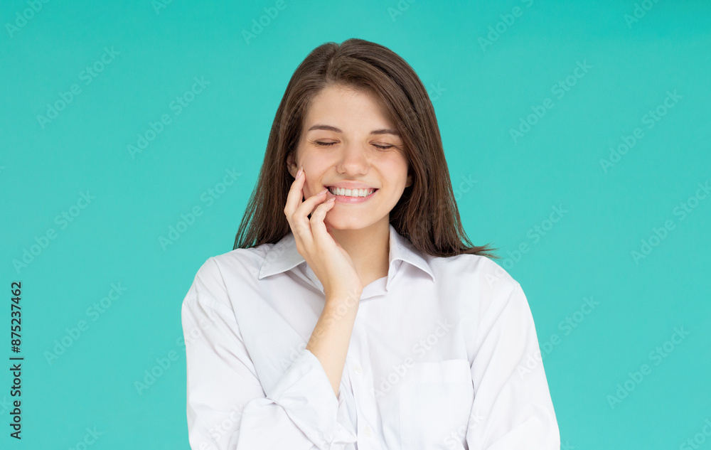 Beautiful caucasian woman dreamy smiling with eyes closed, standing relaxed and happy against blue background. Copy space Beautiful caucasian woman dreamy smiling with eyes closed, standing relaxed and happy against blue background. Copy space