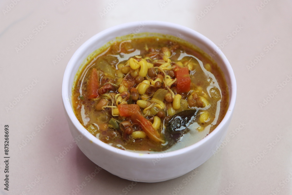 Sprouted Moth beans curry or Matki chi usal is a Popular Maharashtrian dish mostly eaten with rice or Chapati, Indian curry Sprouted Moth beans curry or Matki chi usal is a Popular Maharashtrian dish mostly eaten with rice or Chapati, Indian curry