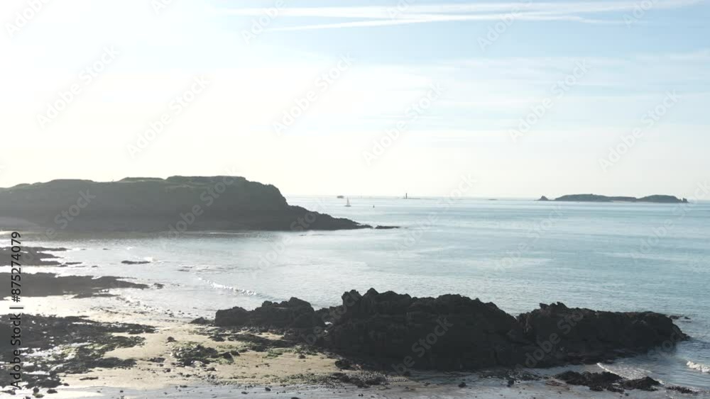Saint-Malo, France. View of the ocean shore during sunset Saint-Malo, France. View of the ocean shore during sunset