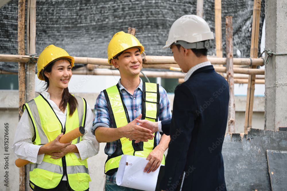 A project manager greets construction workers on-site with a handshake, fostering strong relationships and team morale and building trust and collaboration to ensure project success A project manager greets construction workers on-site with a handshake, fostering strong relationships and team morale and building trust and collaboration to ensure project success