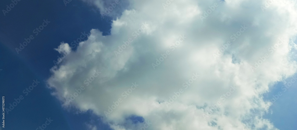 View of the sky with beautiful clustered clouds View of the sky with beautiful clustered clouds