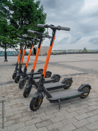 Parking of e-scooters. Scooter-sharing system of city transportation.