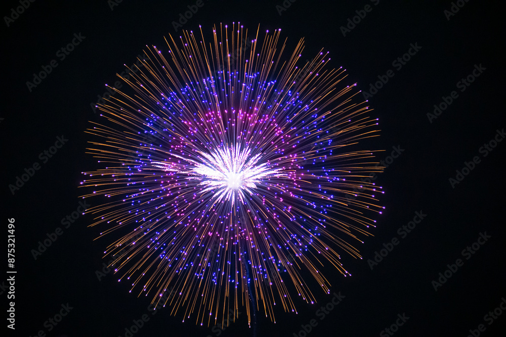 Huge multi coloured fireworks on the dark sky background. Fireworks festival celebration from Loto Quebec. Huge multi coloured fireworks on the dark sky background. Fireworks festival celebration from Loto Quebec.