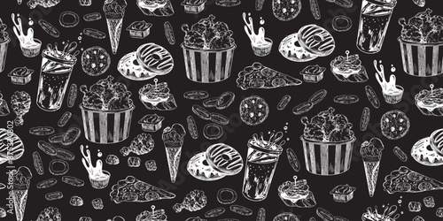 Seamless pattern with fast food. Drawn on chalkboard sketch style chicken nuggets, dipping sauce, burger, donut, fried onion rings, soda, ice cream, pizza, tapas. Hand drawn street food