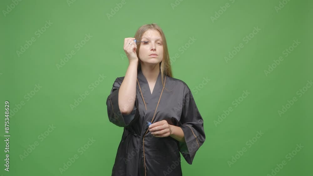 Eyelashes makeup, woman applying mascara on lashes. Green screen Eyelashes makeup, woman applying mascara on lashes. Green screen
