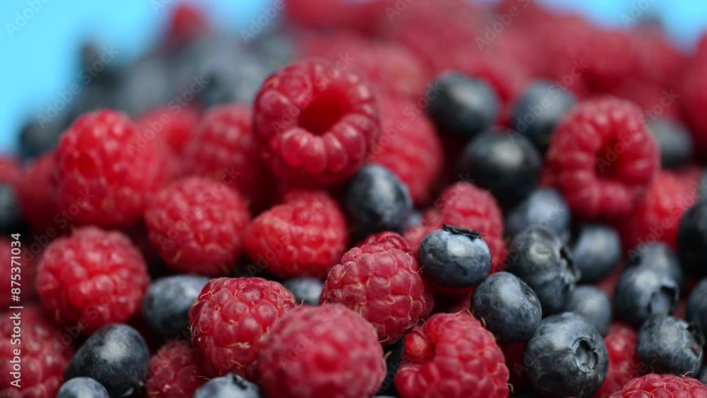background of blueberries and raspberries background of blueberries and raspberries