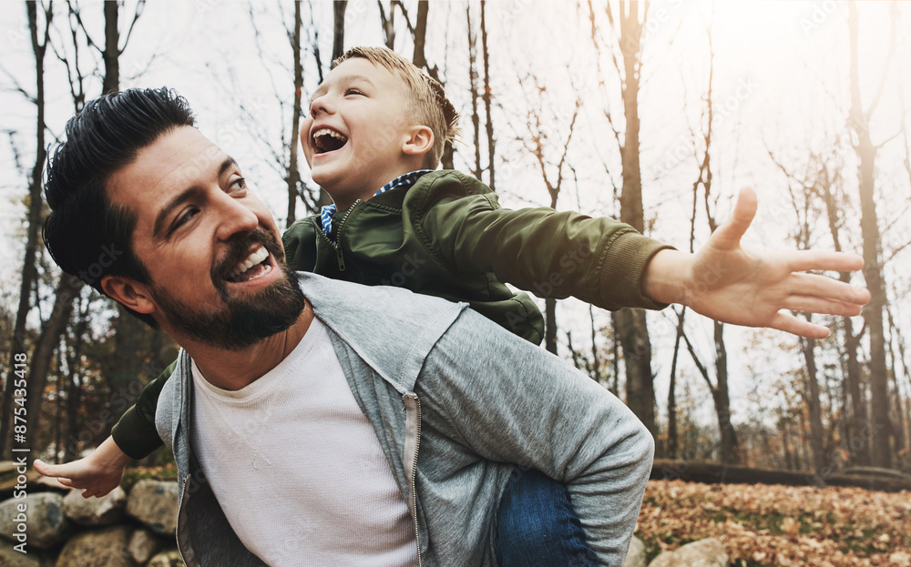 Obraz premium Nature, piggyback and father with boy in outdoor park for game, fun and bonding together. Forest, playing and happy man with child on back for support, weekend trip or autumn weather in Washington