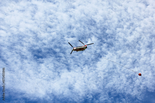 Firefighter Two Screw Helicopter In The Sky