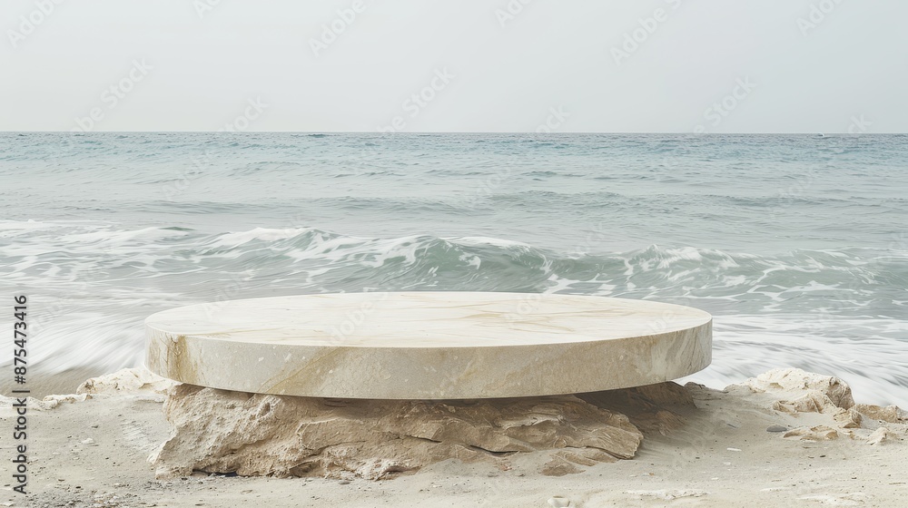 an empty podium made of natural stone, placed on a sandy beach with gentle waves in the background. an empty podium made of natural stone, placed on a sandy beach with gentle waves in the background.