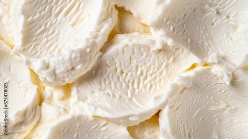 Close-up of soft-ripened ricotta cheese, creamy texture with delicate mold patterns, illuminated in cinematic lighting, emphasizing rich and smooth surfaces photo