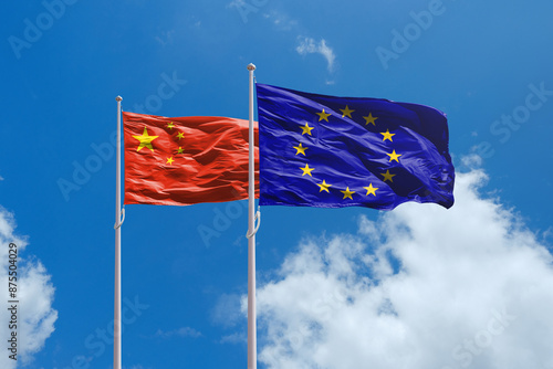 EU and China flags above blue sky. China and Europe Union trade war. EU dutys for EV cars made in China