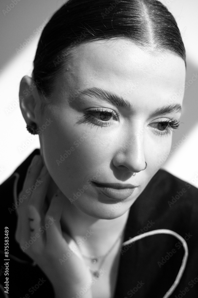 Black and white portrait of a beautiful white girl. Closeup face of young beautiful woman Black and white portrait of a beautiful white girl. Closeup face of young beautiful woman
