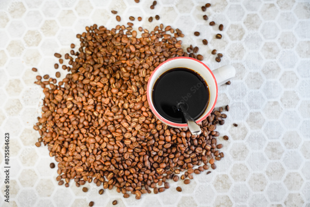 Naklejka premium A cup of coffee and coffee beans
