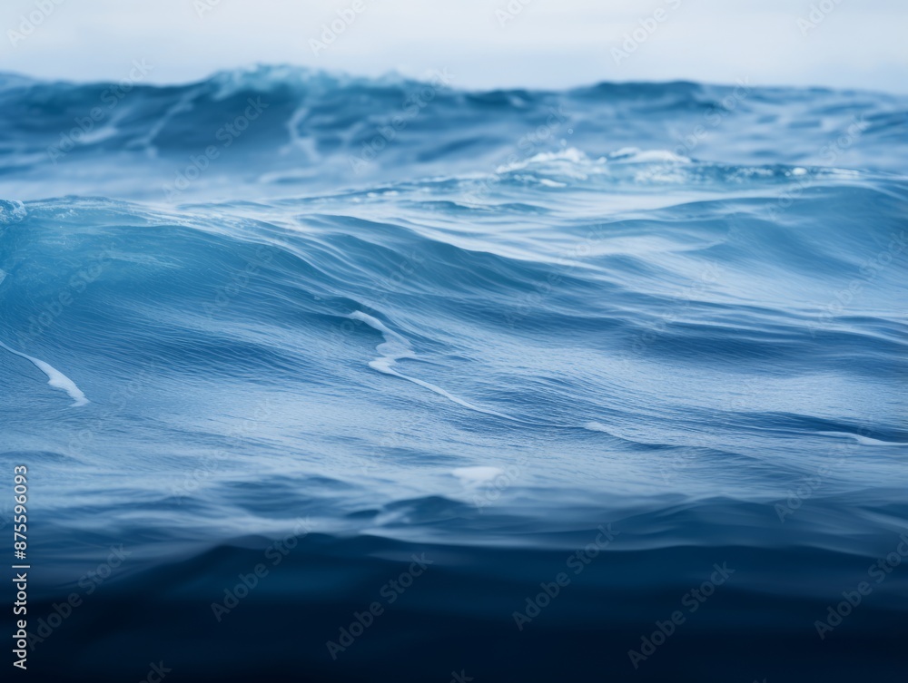 Fototapeta premium a view of the ocean from above with waves in the background