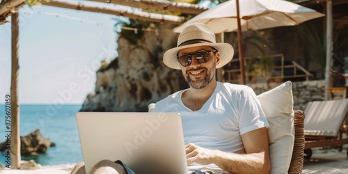 Happy Person Working Remotely on Laptop During Summer Vacation, Embracing the Concept of Digital Nomad Lifestyle, Perfect for International Remote Work Day Promotions photo