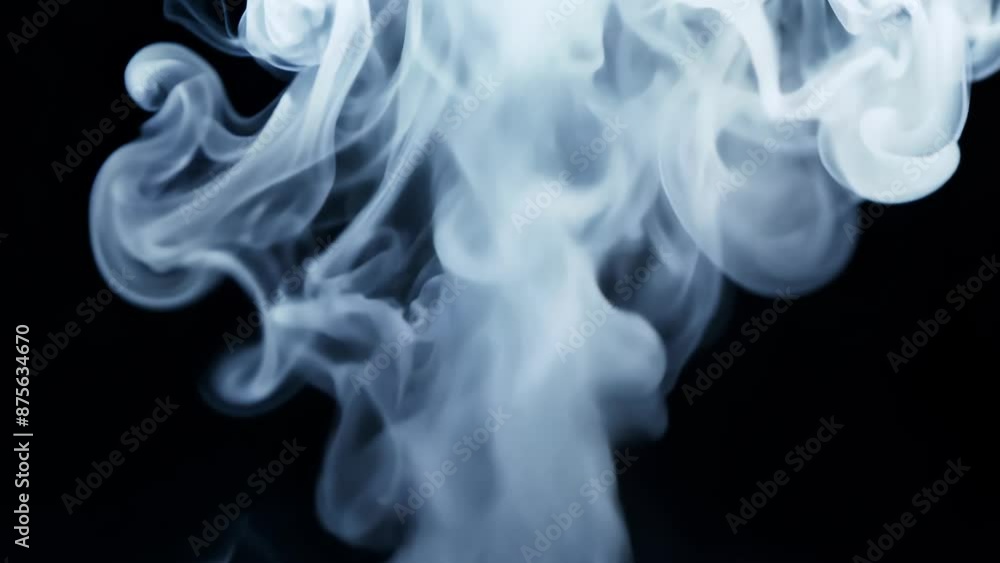 Wispy white smoke drifts gracefully against pitch-black background. Ethereal tendrils create mysterious, tranquil atmosphere. Soft illumination gives smoke ghostly glow, evoking otherworldly essence. Wispy white smoke drifts gracefully against pitch-black background. Ethereal tendrils create mysterious, tranquil atmosphere. Soft illumination gives smoke ghostly glow, evoking otherworldly essence.
